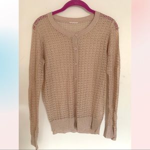 Knitted light sweater on buttons